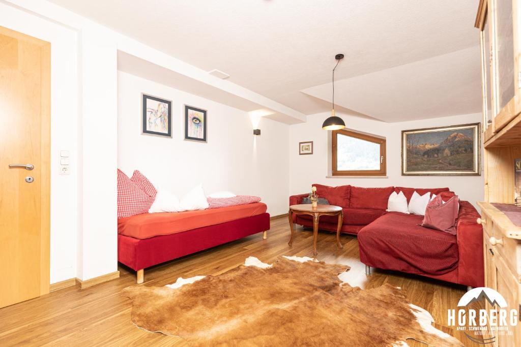 Televízia a/alebo spoločenská miestnosť v ubytovaní HORBERG Appartements
