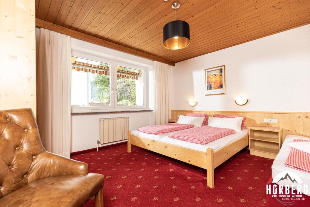 Posteľ alebo postele v izbe v ubytovaní HORBERG Appartements