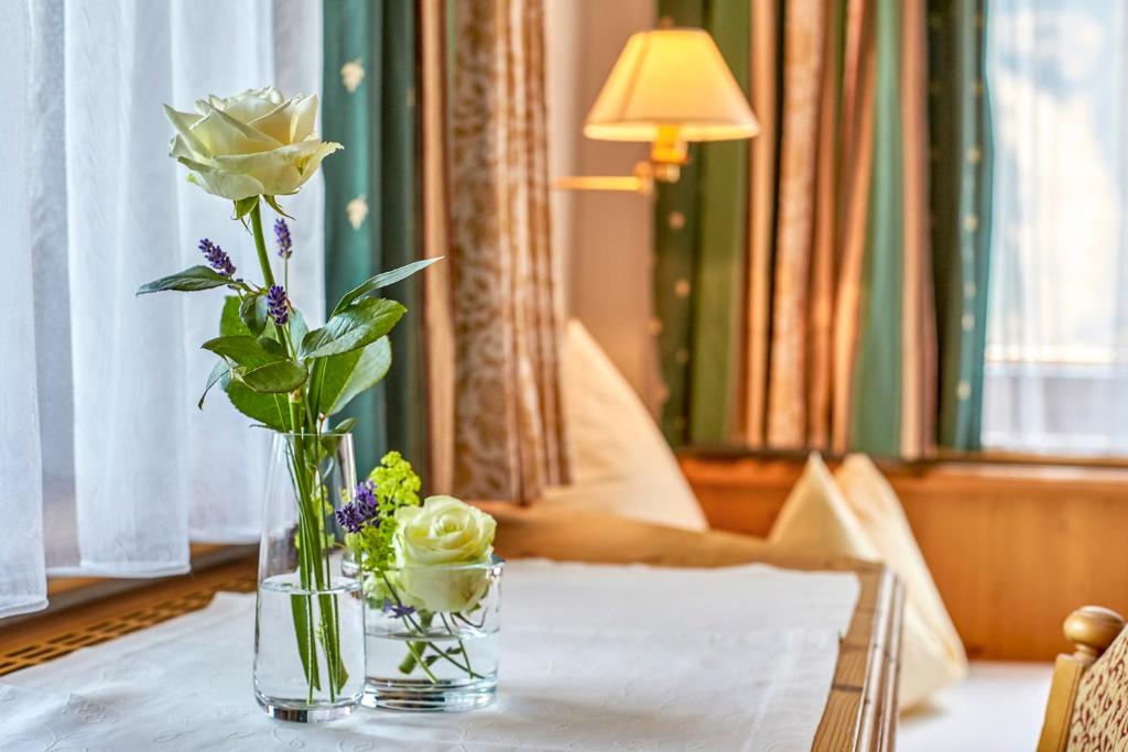 Postel nebo postele na pokoji v ubytování Hotel Sonnhof