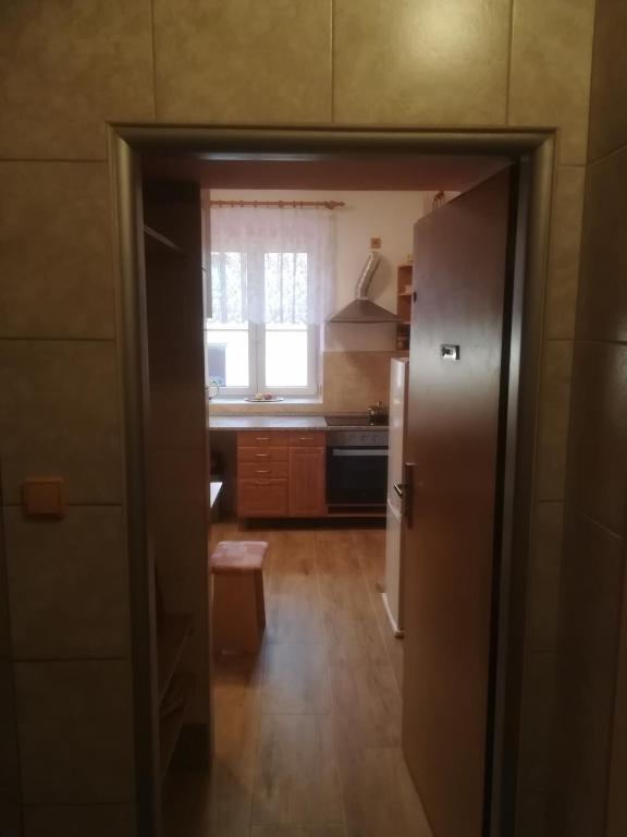 Kuchyň nebo kuchyňský kout v ubytování Apartmány pod Barunčinou školou