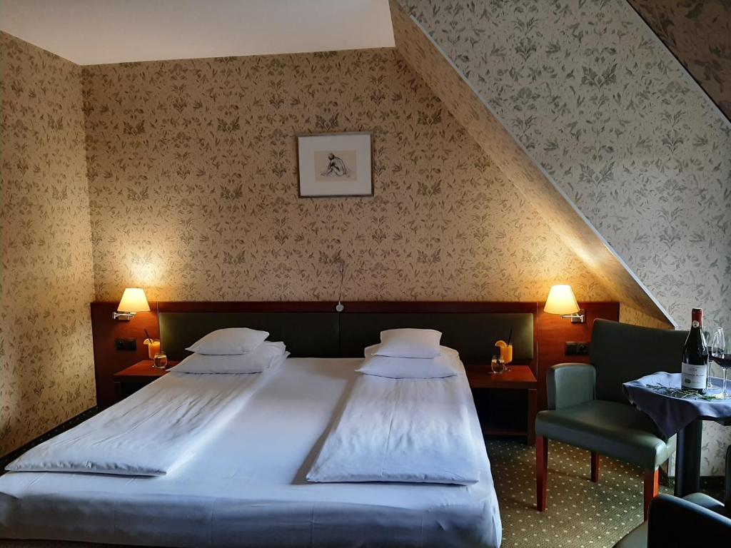 Postel nebo postele na pokoji v ubytování Hotel 1231