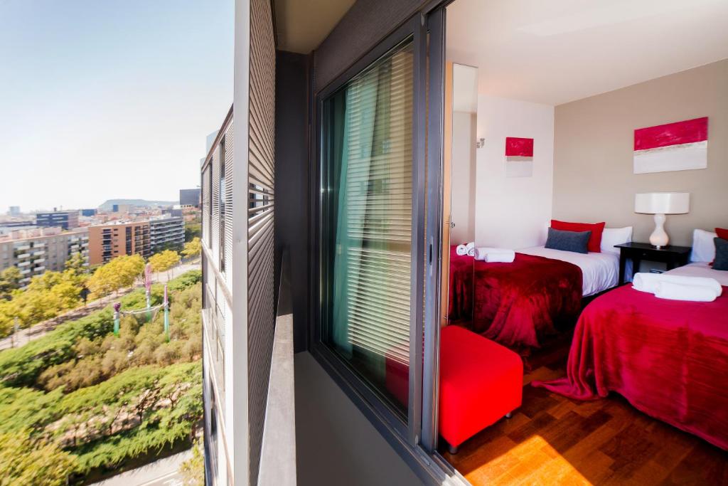Posteľ alebo postele v izbe v ubytovaní Victoria Diagonal Mar Barcelona