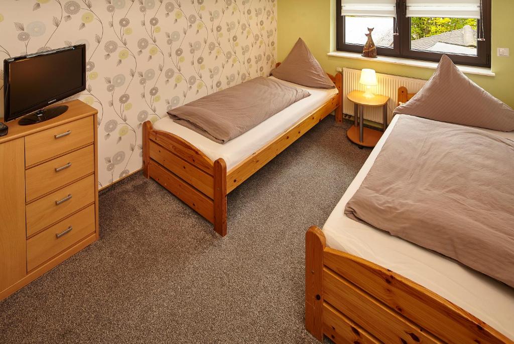 Postel nebo postele na pokoji v ubytování Gasthaus Mester
