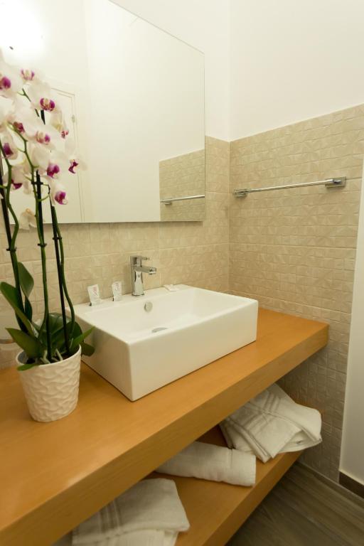 Kúpeľňa v ubytovaní Oasi Guzzetta Hotel&Case Vacanze