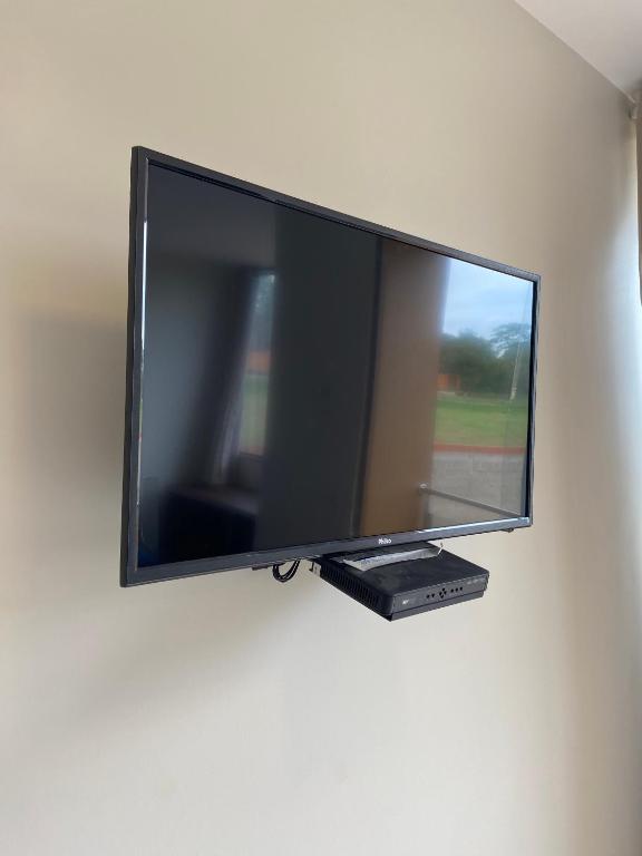 TV a/nebo společenská místnost v ubytování Delú Residences
