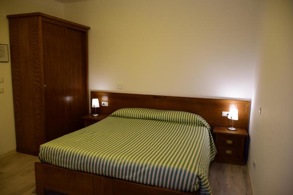 Postel nebo postele na pokoji v ubytování Park Hotel Elefante
