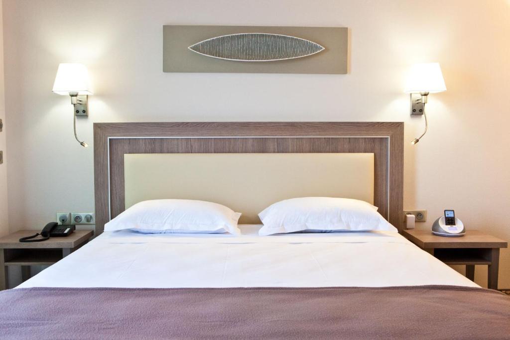 Кровать или кровати в номере Villa Azur