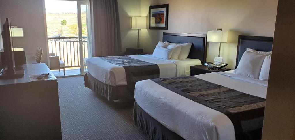 Ein Bett oder Betten in einem Zimmer der Unterkunft Wingate by Wyndham Page Lake Powell