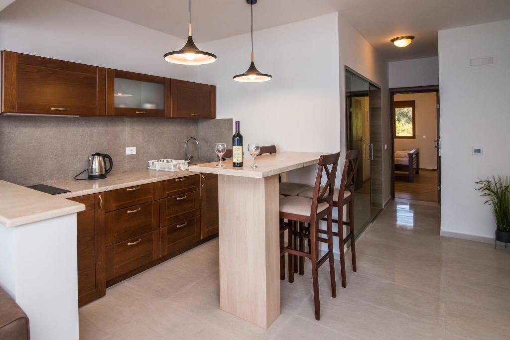 Kuchyň nebo kuchyňský kout v ubytování Arabela 2 Apartments