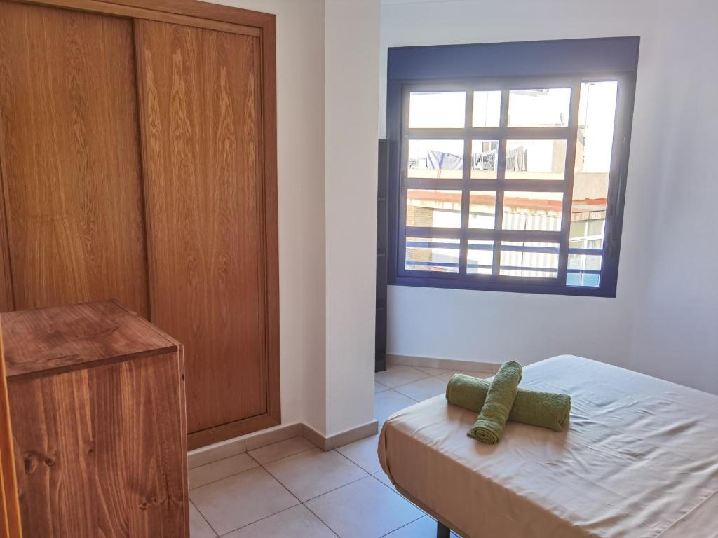 Postel nebo postele na pokoji v ubytování Torrevieja 2