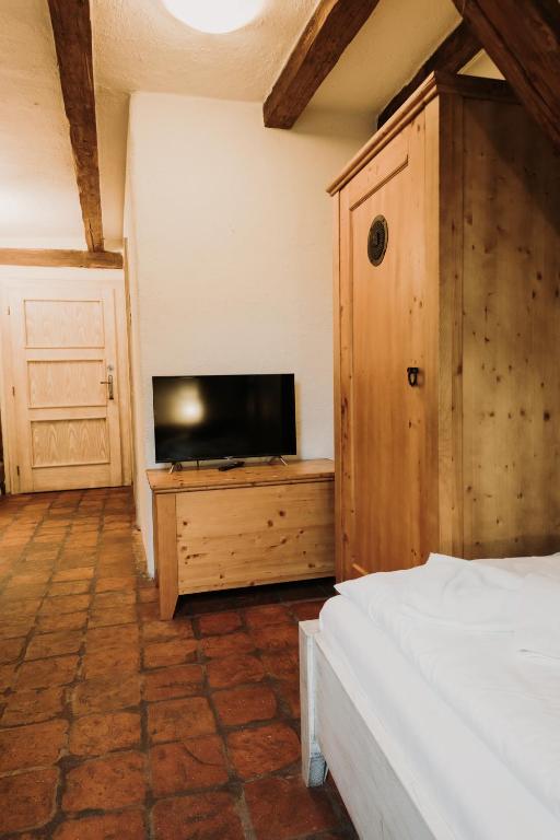 Postel nebo postele na pokoji v ubytování Hotel U Hrabenky