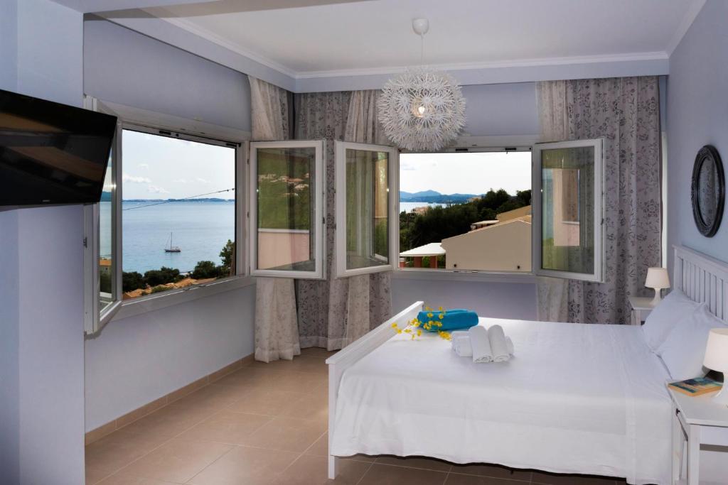 Posteľ alebo postele v izbe v ubytovaní Corfu Sea View Villa - Cleo