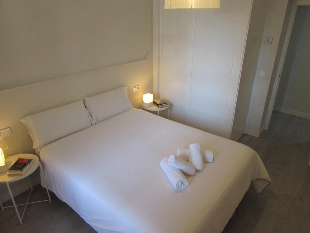 Posteľ alebo postele v izbe v ubytovaní Apartamento a 50 metros de la playa malagueta con vistas al mar