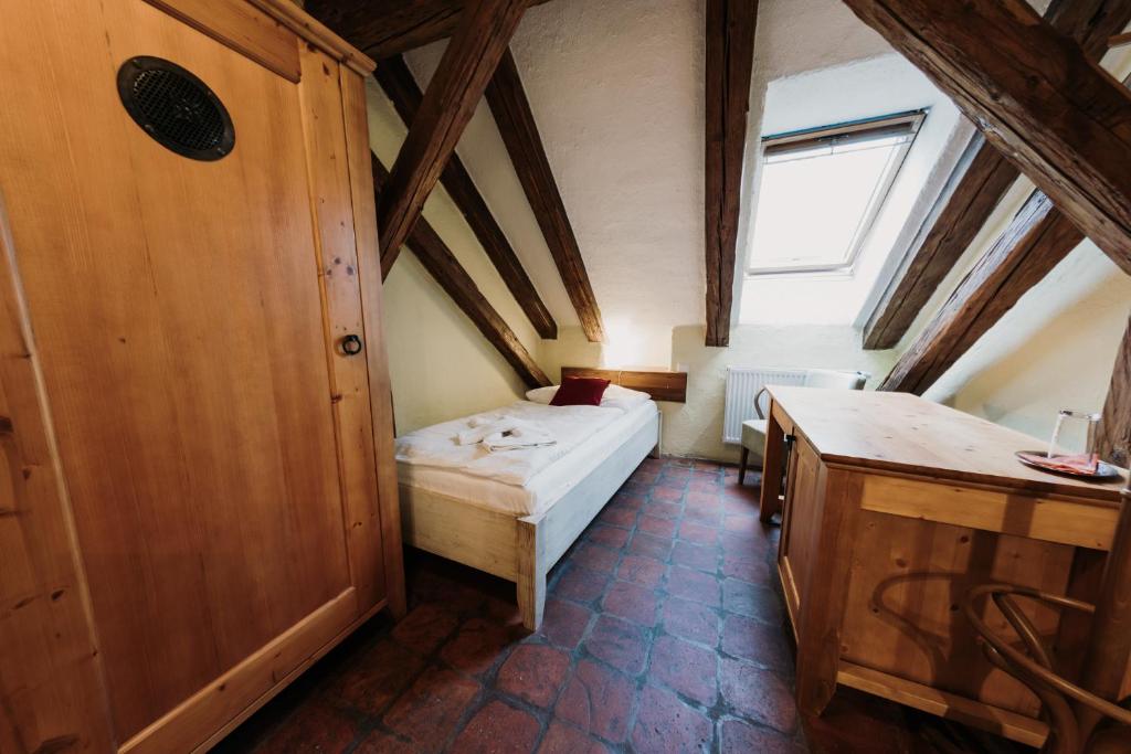 Postel nebo postele na pokoji v ubytování Hotel U Hrabenky