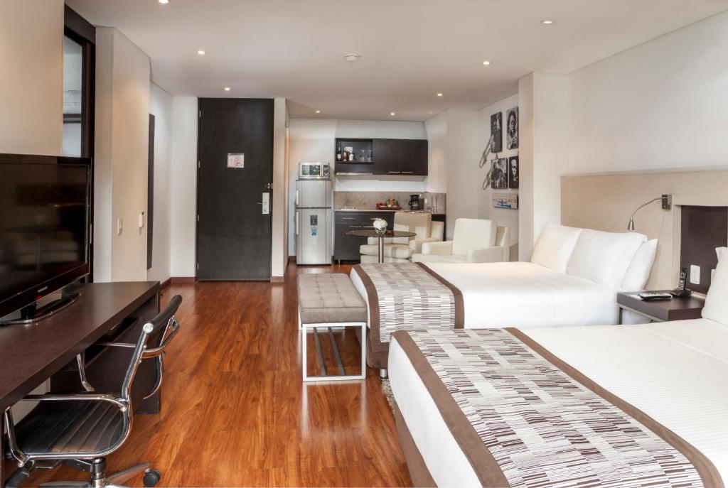 Kuchyň nebo kuchyňský kout v ubytování Hotel Jazz Apartments
