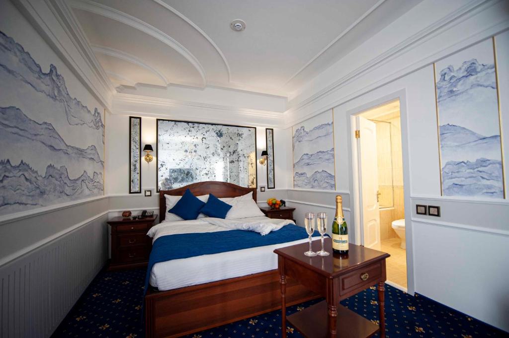 Posteľ alebo postele v izbe v ubytovaní Бутик-отель GLORIA