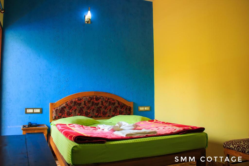 Postel nebo postele na pokoji v ubytování Smm Cottage