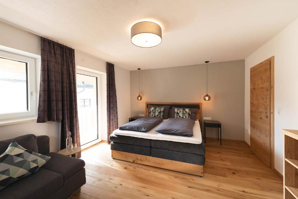 Postel nebo postele na pokoji v ubytování Appartements Seven Summits