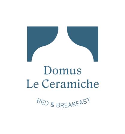 a logo for a dementia lab and breakfast at Domus Le Ceramiche in Grottaglie