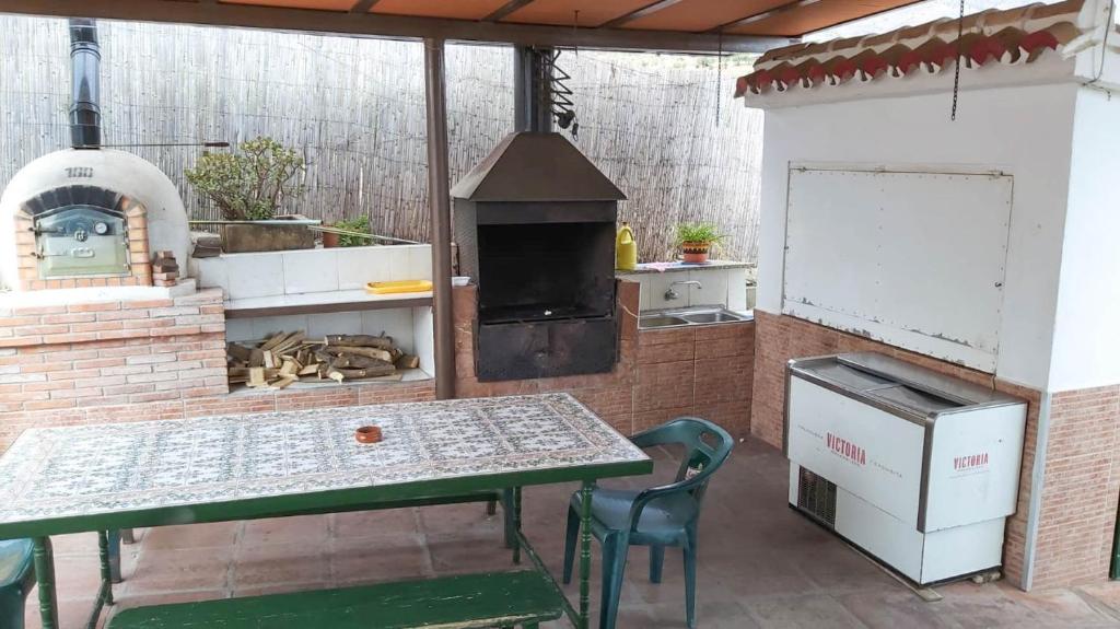 Kuchyň nebo kuchyňský kout v ubytování Casa Rural Los Caballos Finca Canca Alora Caminito del Rey