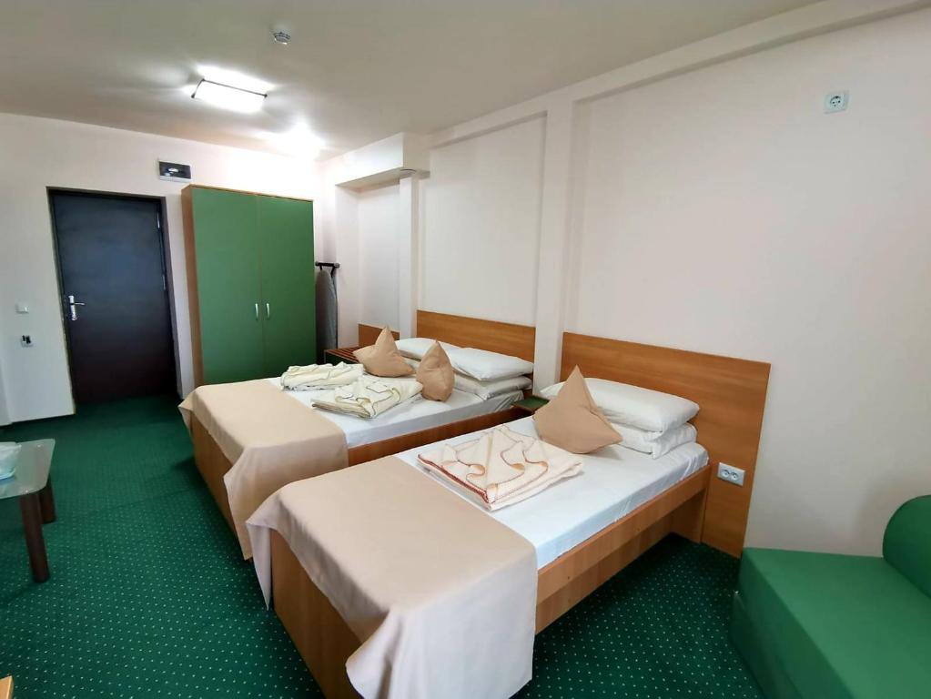Postel nebo postele na pokoji v ubytování Delta Palace
