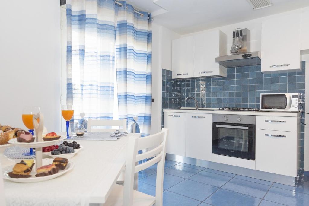 Kuchnia lub aneks kuchenny w obiekcie Acca residence