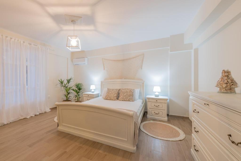 Fotografie z fotogalerie ubytování White Collection Villas & Suites - Pnoe Villa v destinaci Pandokrátor