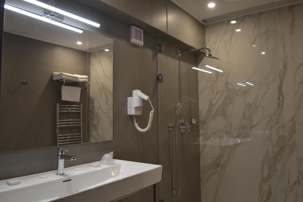 Koupelna v ubytování Hotel Univers