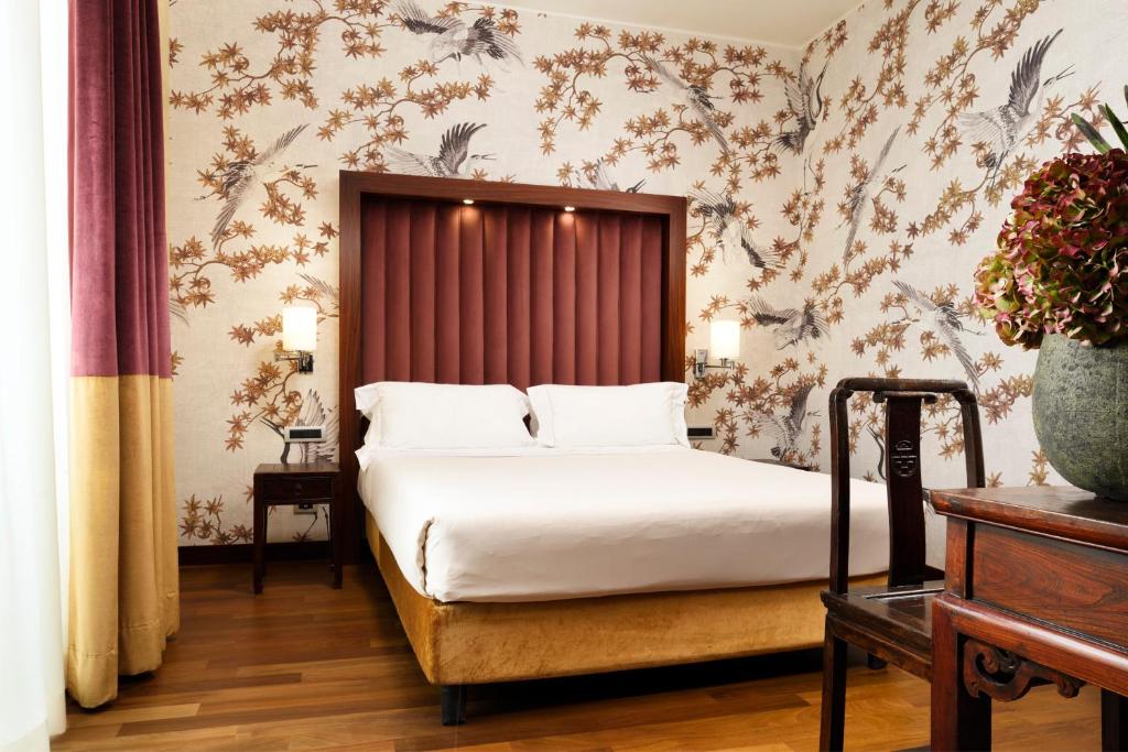 Postel nebo postele na pokoji v ubytování Enterprise Hotel Design & Boutique