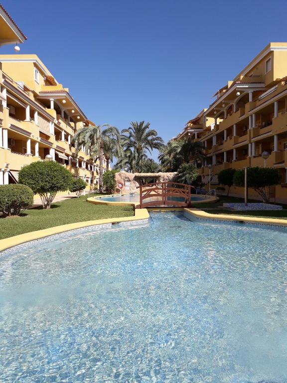 Bazén v ubytování Precioso apart sur y norte cerca playa y centro - Cascadas de la Marina nebo v jeho okolí