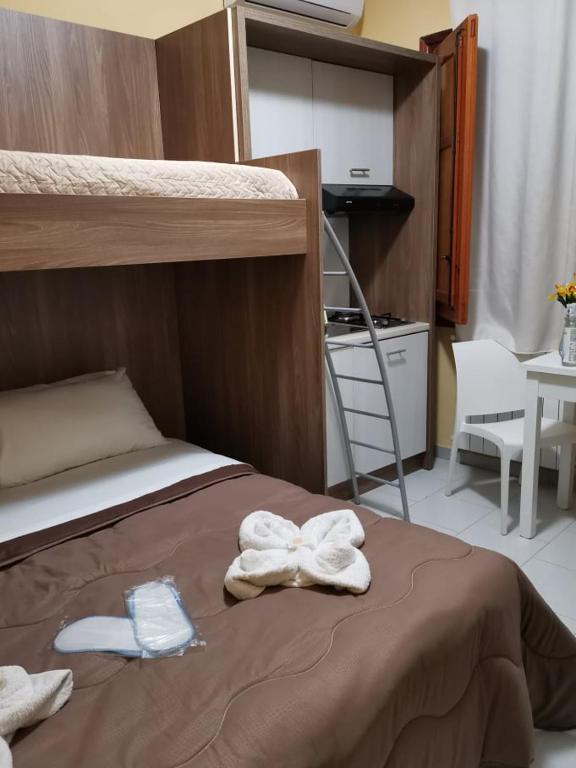 Posteľ alebo postele v izbe v ubytovaní Fratelli Clemente Spa and Hotel