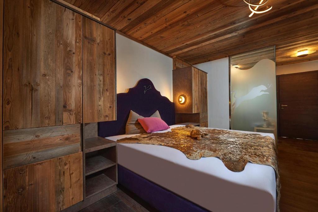 Posteľ alebo postele v izbe v ubytovaní Hotel Panther'A