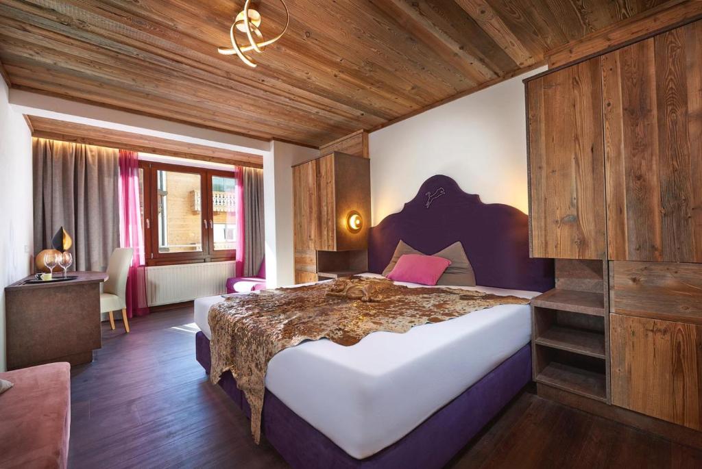 Posteľ alebo postele v izbe v ubytovaní Hotel Panther'A