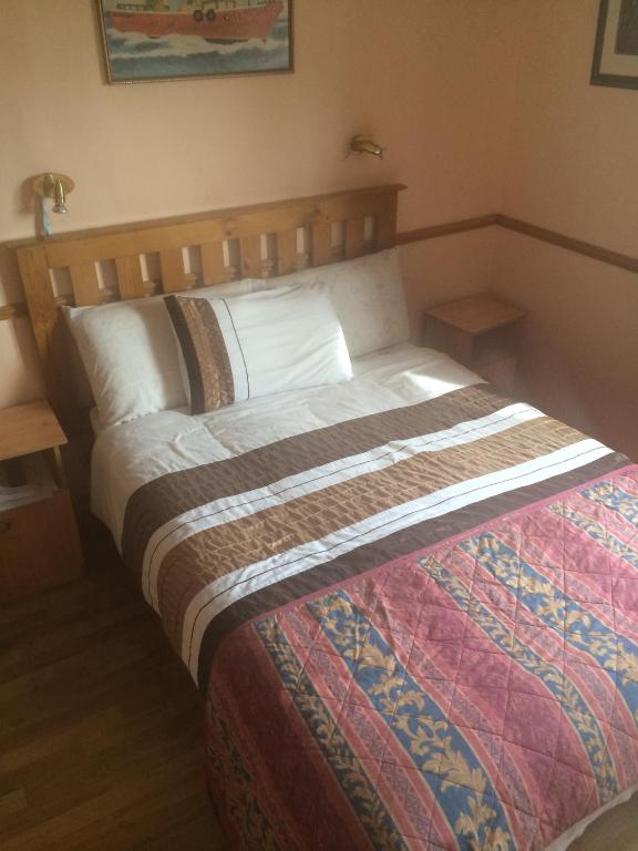 Postel nebo postele na pokoji v ubytování Ard Mhuiris B&B