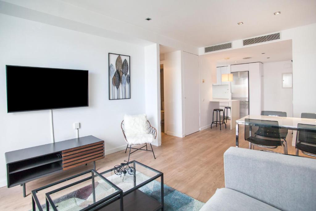 Televízia a/alebo spoločenská miestnosť v ubytovaní Tendency Apartments 12 Penthouse