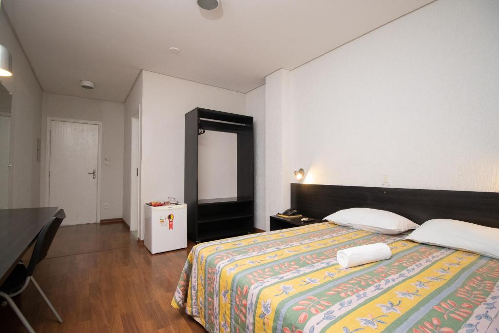 Postel nebo postele na pokoji v ubytování Hotel Bramig