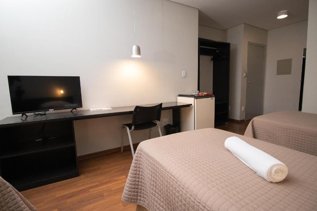 TV a/nebo společenská místnost v ubytování Hotel Bramig