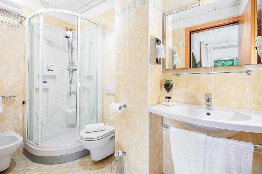 Koupelna v ubytování Hotel Rex