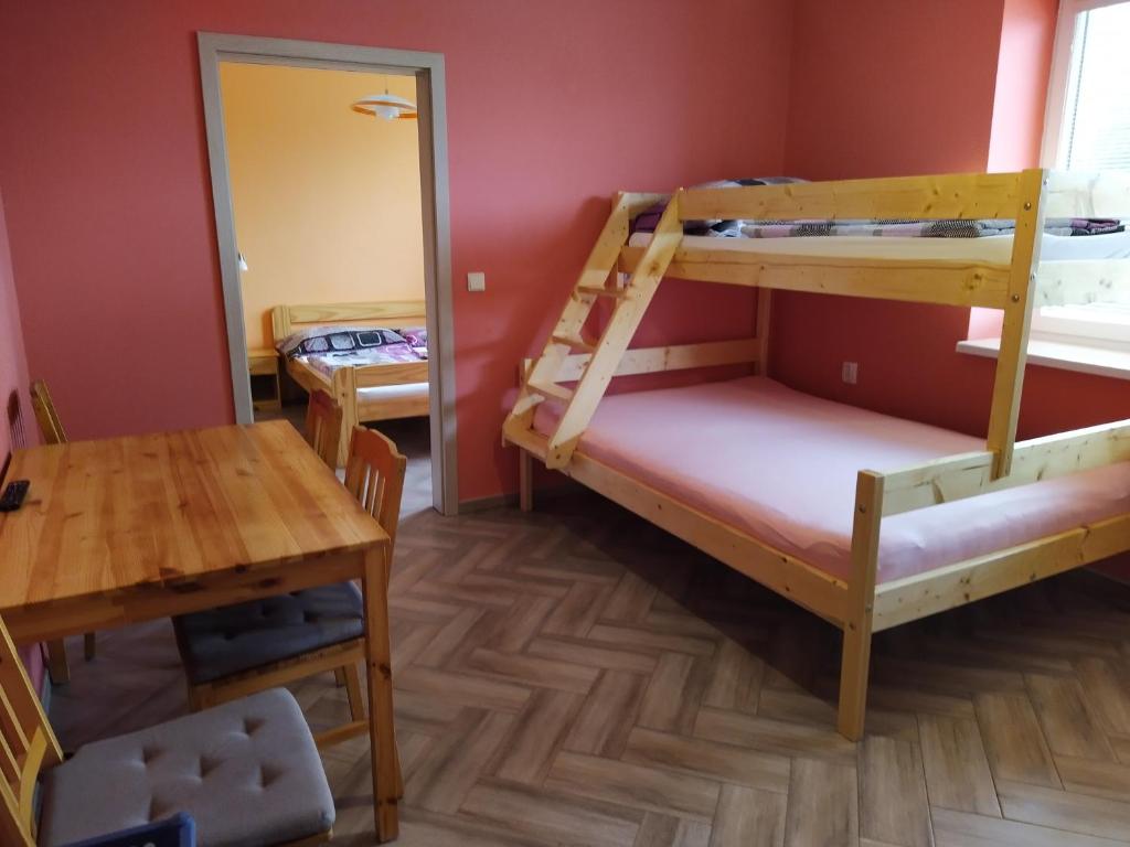 Postel nebo postele na pokoji v ubytování Apartments Klentnice U Mikulova