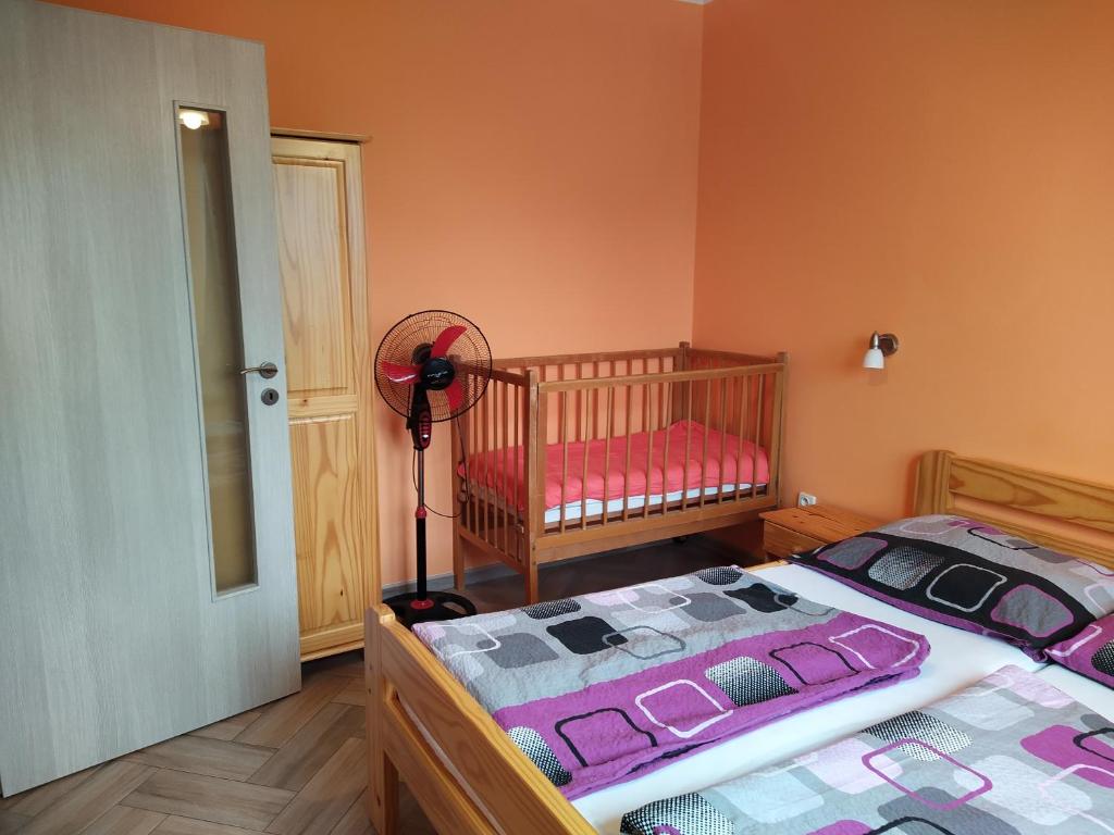 Postel nebo postele na pokoji v ubytování Apartments Klentnice U Mikulova
