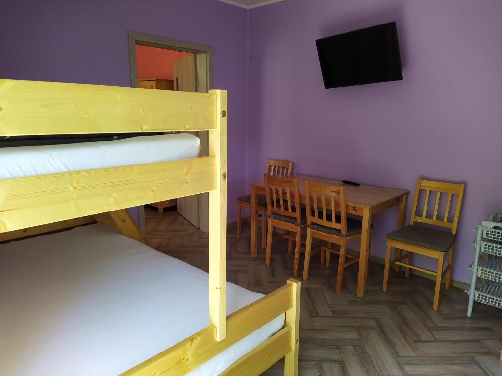 Postel nebo postele na pokoji v ubytování Apartments Klentnice U Mikulova