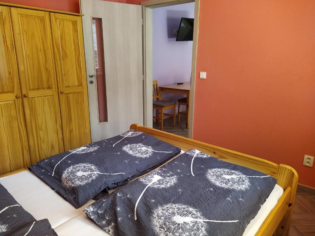Postel nebo postele na pokoji v ubytování Apartments Klentnice U Mikulova