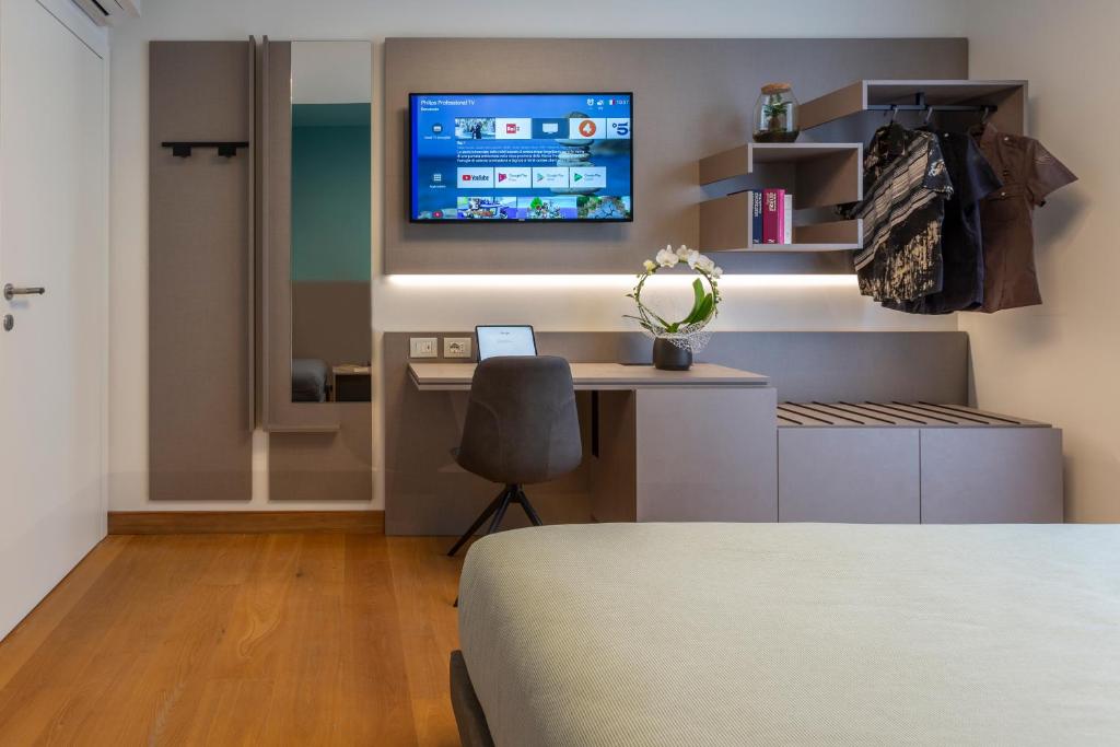 TV a/nebo společenská místnost v ubytování Habitat Guest House