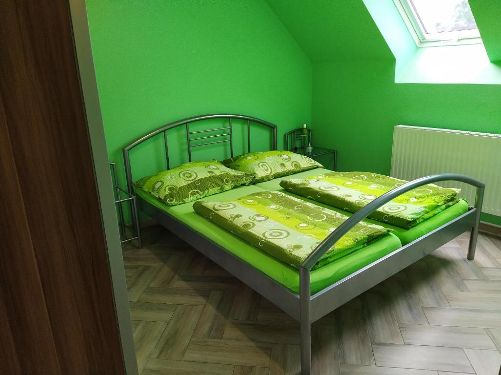 Postel nebo postele na pokoji v ubytování Apartments Klentnice U Mikulova