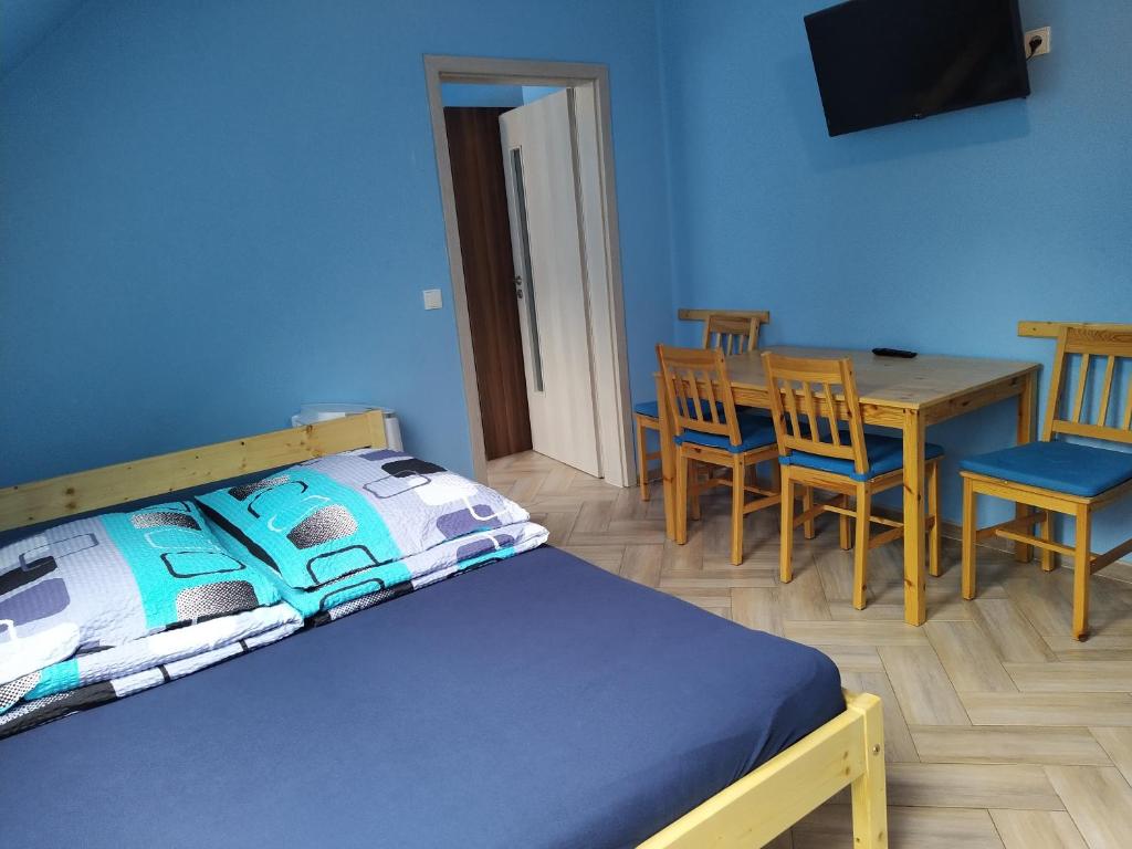 Postel nebo postele na pokoji v ubytování Apartments Klentnice U Mikulova