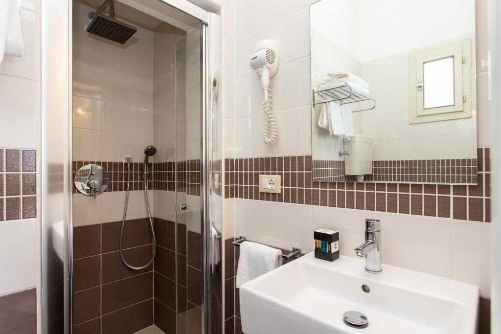 Koupelna v ubytování Hotel Conchiglia