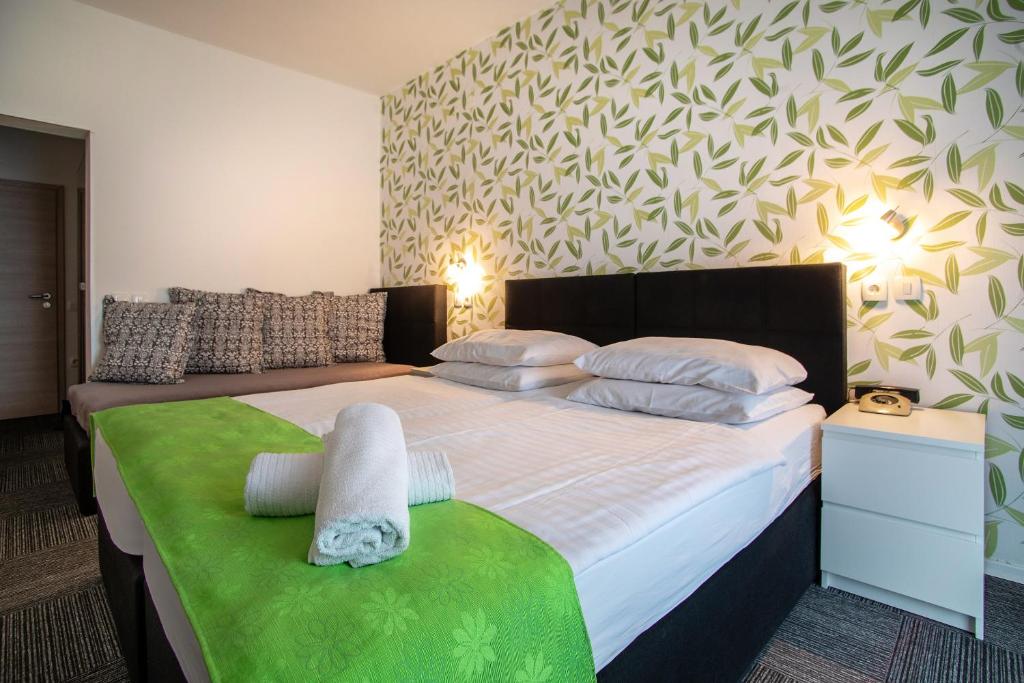 Cama o camas de una habitación en Hotel Bio