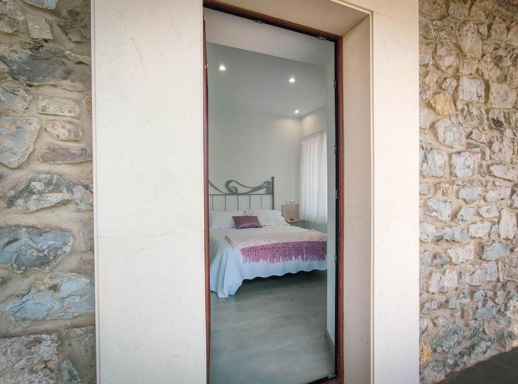 Postel nebo postele na pokoji v ubytování Hostal Óleo Auto Check-in