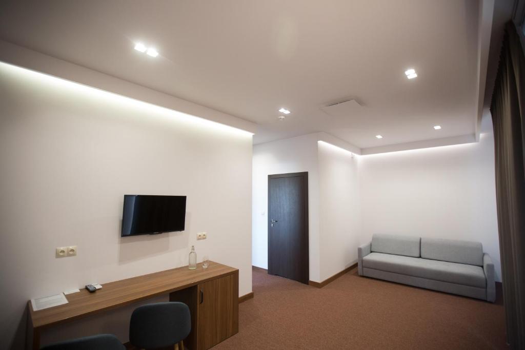 TV a/nebo společenská místnost v ubytování Hotel Rubin