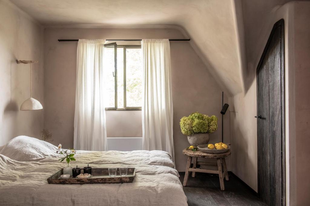 Postel nebo postele na pokoji v ubytování Gîte Au Bout du Verger